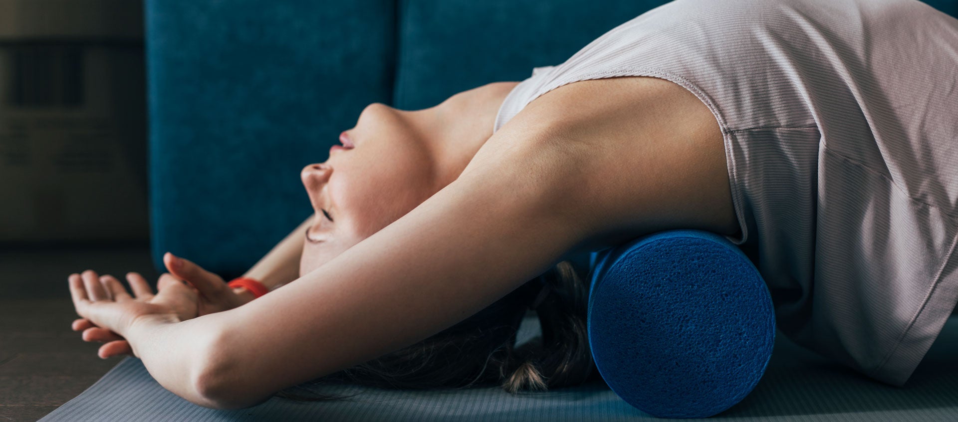 body harmony woman stretching on foam roller
