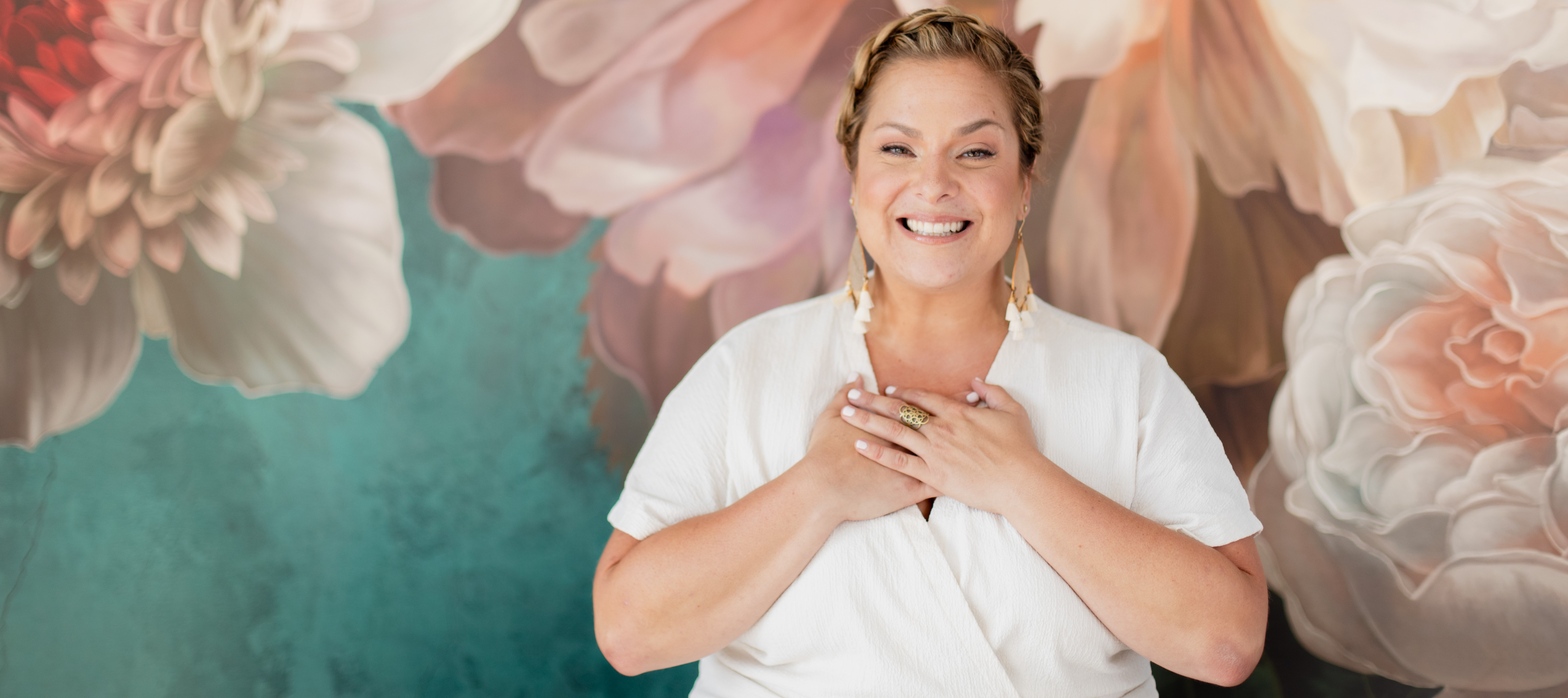 Fall in Love with Yourself and Life Shannon Kaiser with her hands over her heart
